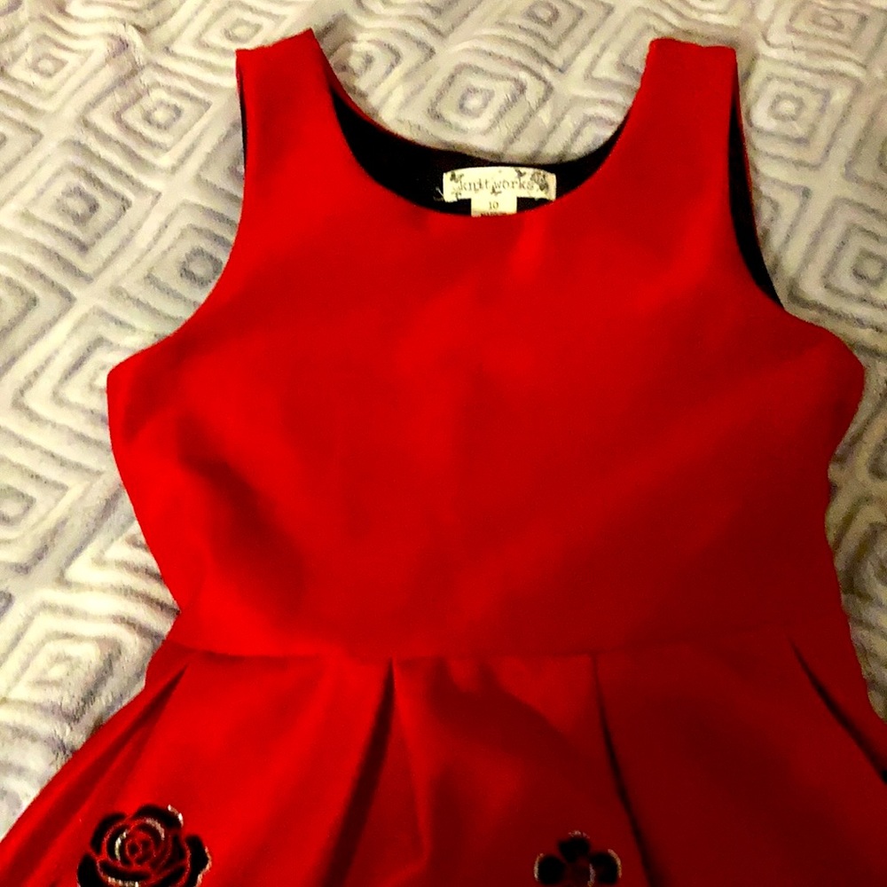 Red and black knitwork’s girls dress